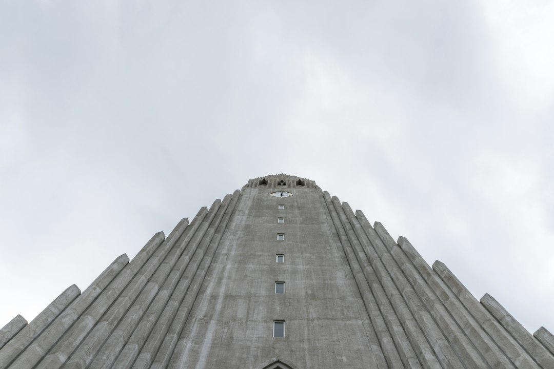low angle photography of gray concrete building